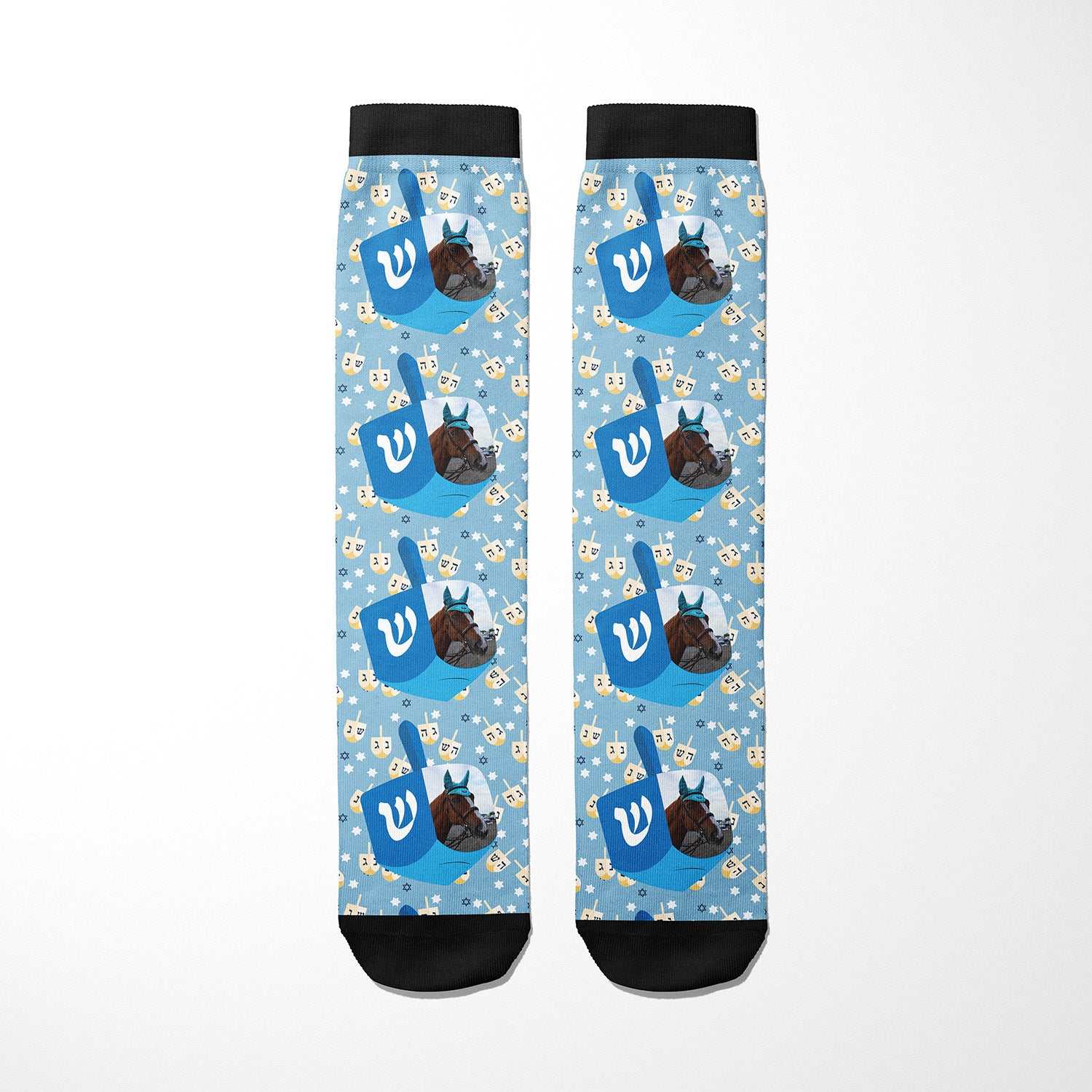 Custom socks featuring blue dreidel and chocolate gelt pattern on light blue background with black toe and cuff accents