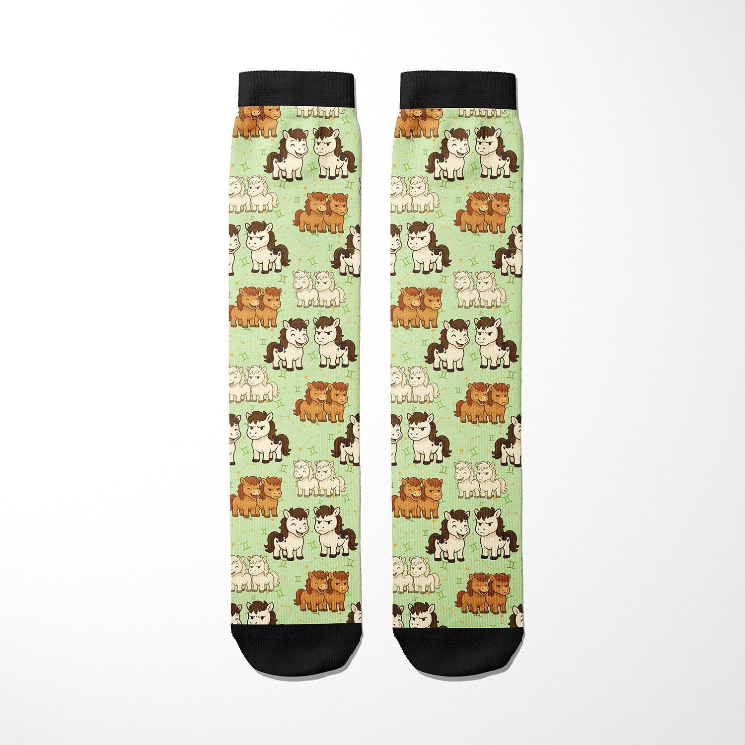 Gemini zodiac themed riding boot socks with horse patterns on green background, made in USA, cotton blend material.
