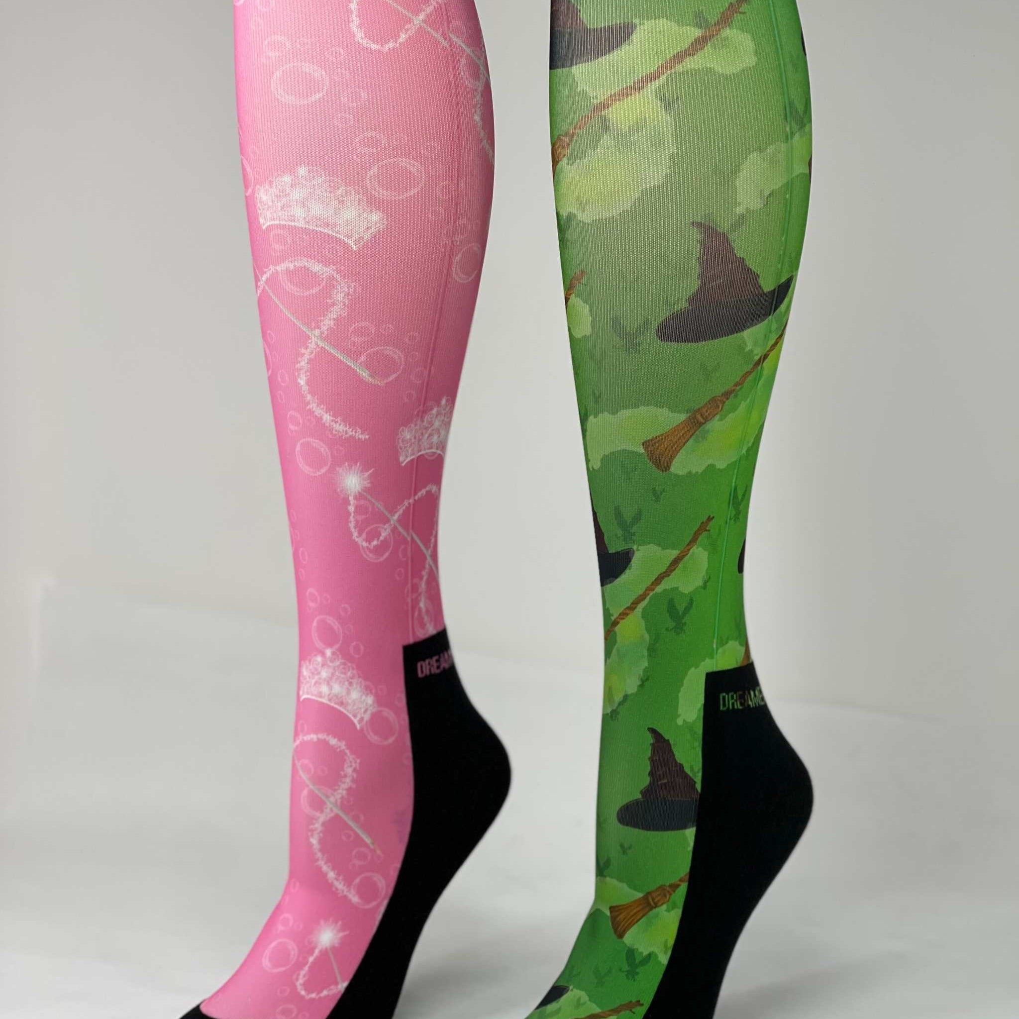 Pair of limited edition wicked boot socks in pink and green with unique magical designs