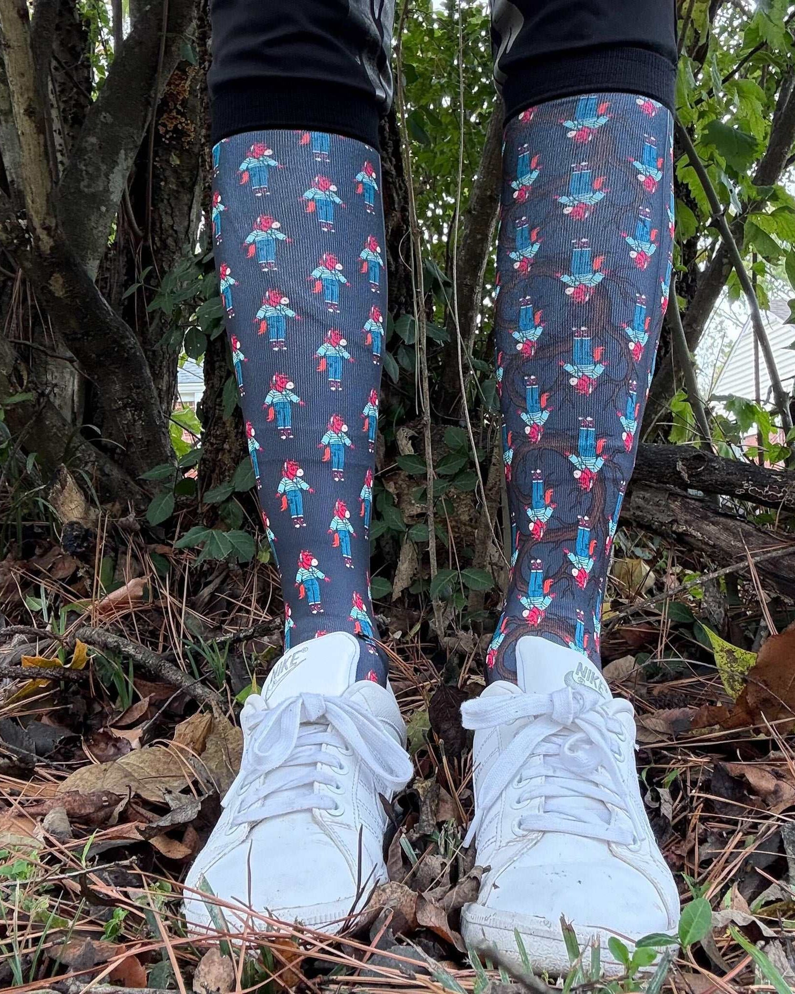 Limited edition Trotting Up That Hill boot socks with vibrant and dark parallel universe designs, made in the USA