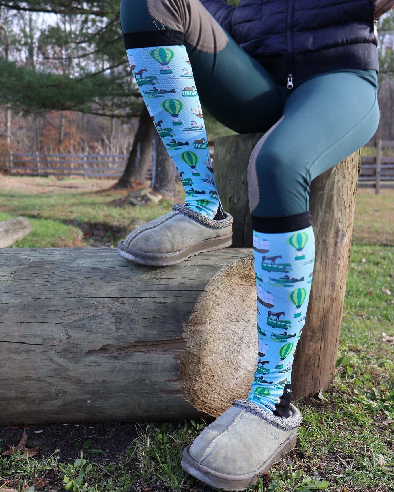 Limited Edition Pony Island Pony Transport Socks with colorful pony and hot air balloon design worn outdoors