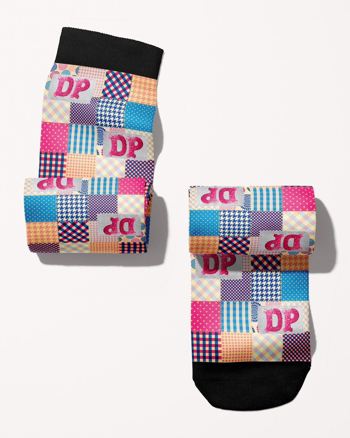 Socks of Many Colors boot socks rolled into a pair, DP patchwork pattern in pink and blue