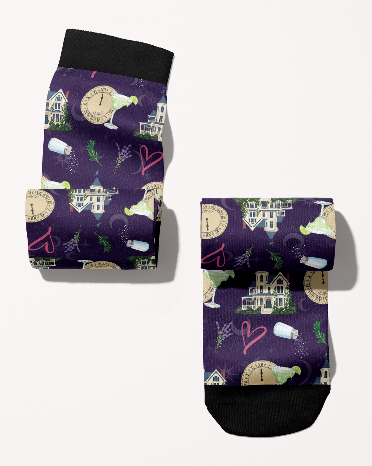 Folded Midnight Margaritas equestrian boot socks, close-up of the margarita glass, clock and Victorian house print