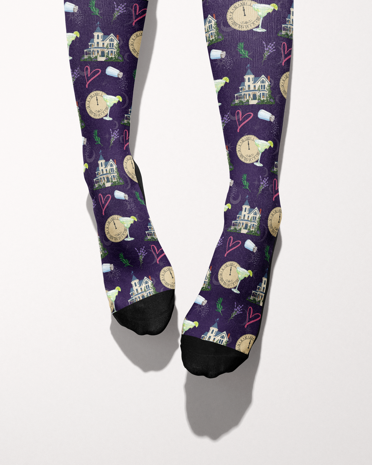 Midnight Margaritas knee-high boot socks shown from the front with contrast black toes and deep purple patterned leg