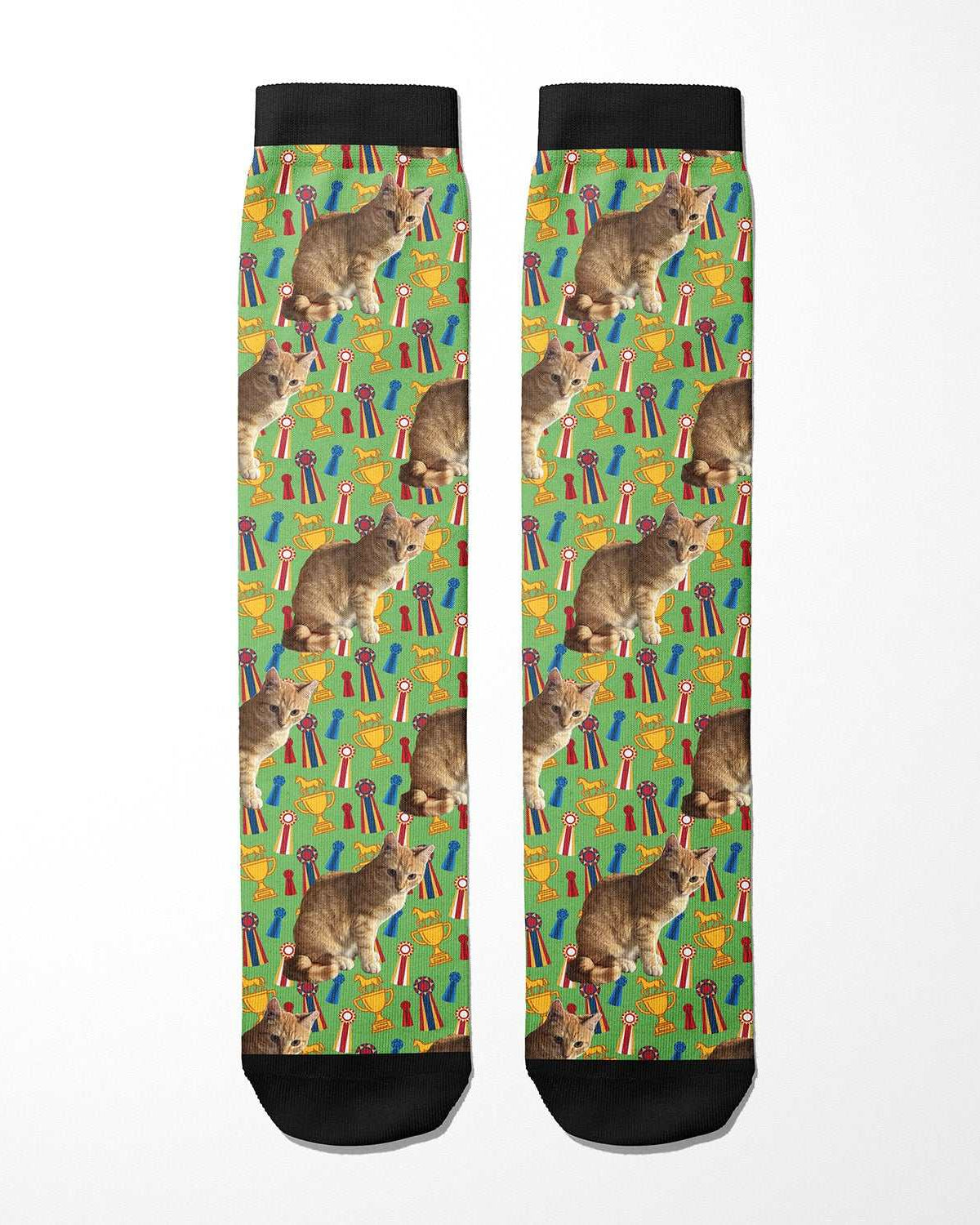 Custom boot socks featuring repeated cat images on a green background with colorful award ribbons and trophies pattern
