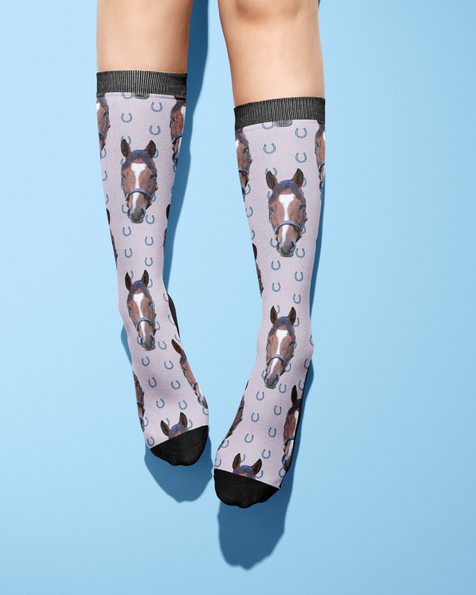 Custom Solo socks with blue horseshoes and horse photo pattern on adult legs