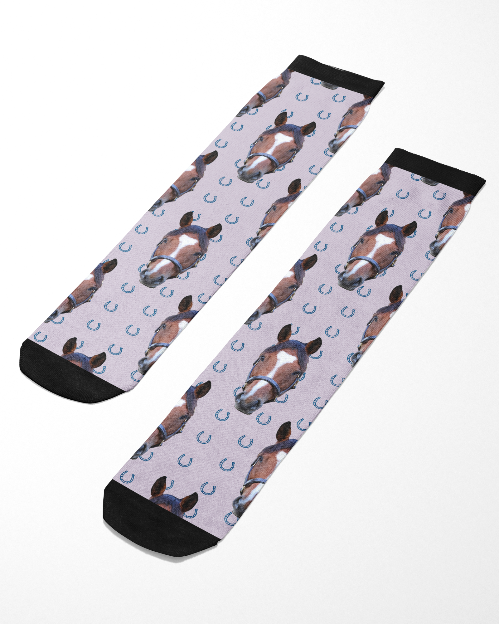 Custom Solo socks with blue horseshoes and horse head pattern on light background