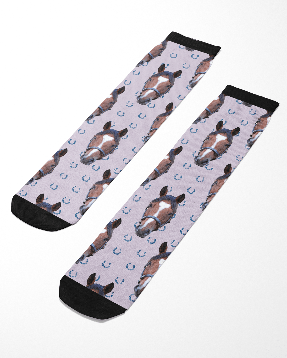 Custom Solo socks with blue horseshoes and horse head pattern on light background