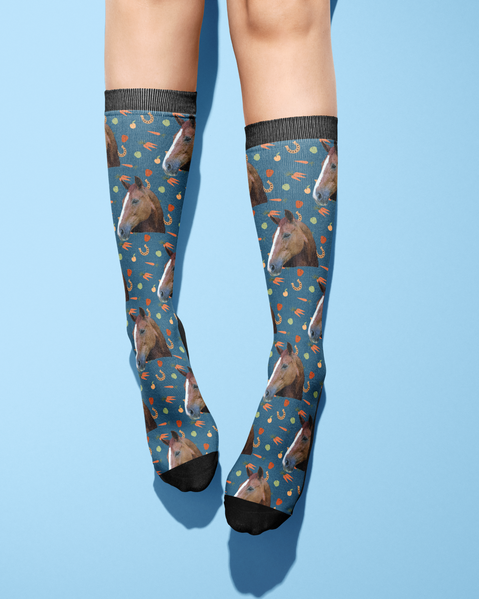 Custom Solo with Stable Snackies Socks featuring horse pattern on blue background worn on legs