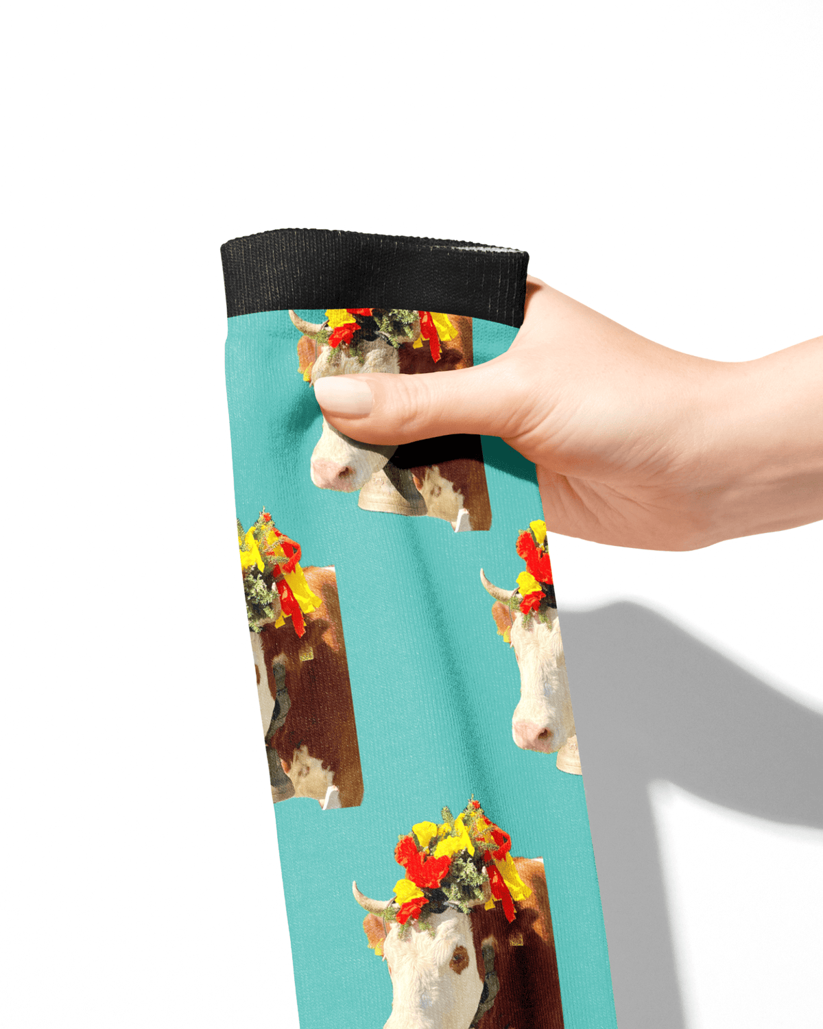 Custom Solo Socks featuring personalized photo design with colorful cow pattern on turquoise background