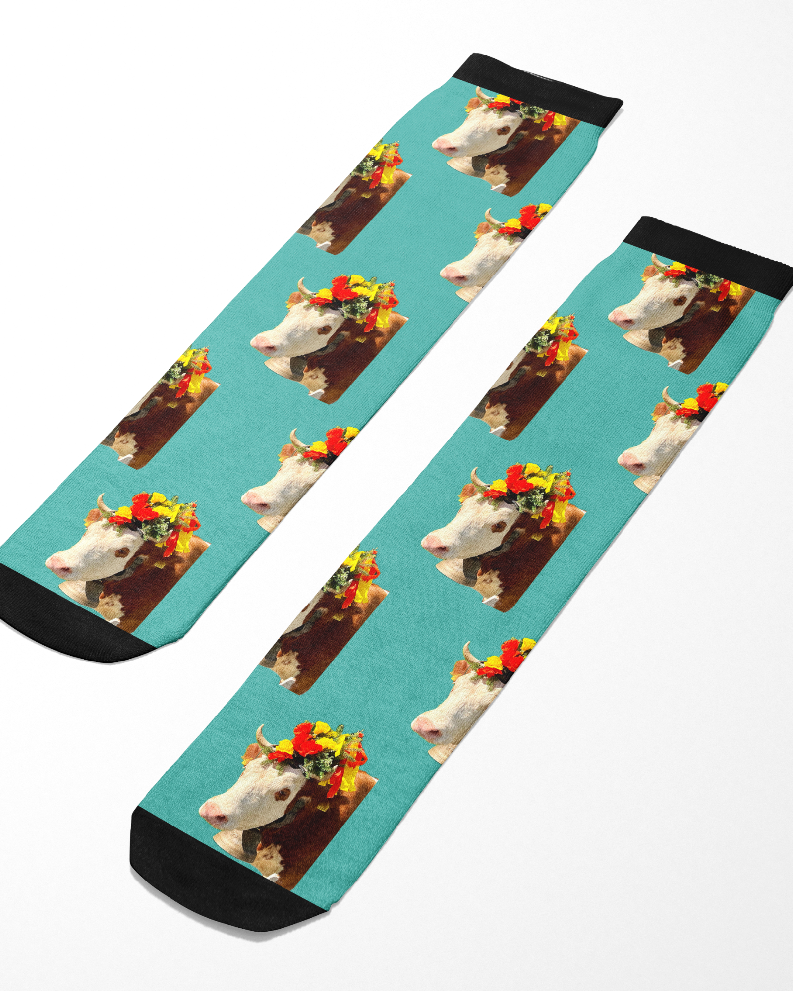 Custom Solo Socks with repeated cow image wearing a flower crown on turquoise background and black accents
