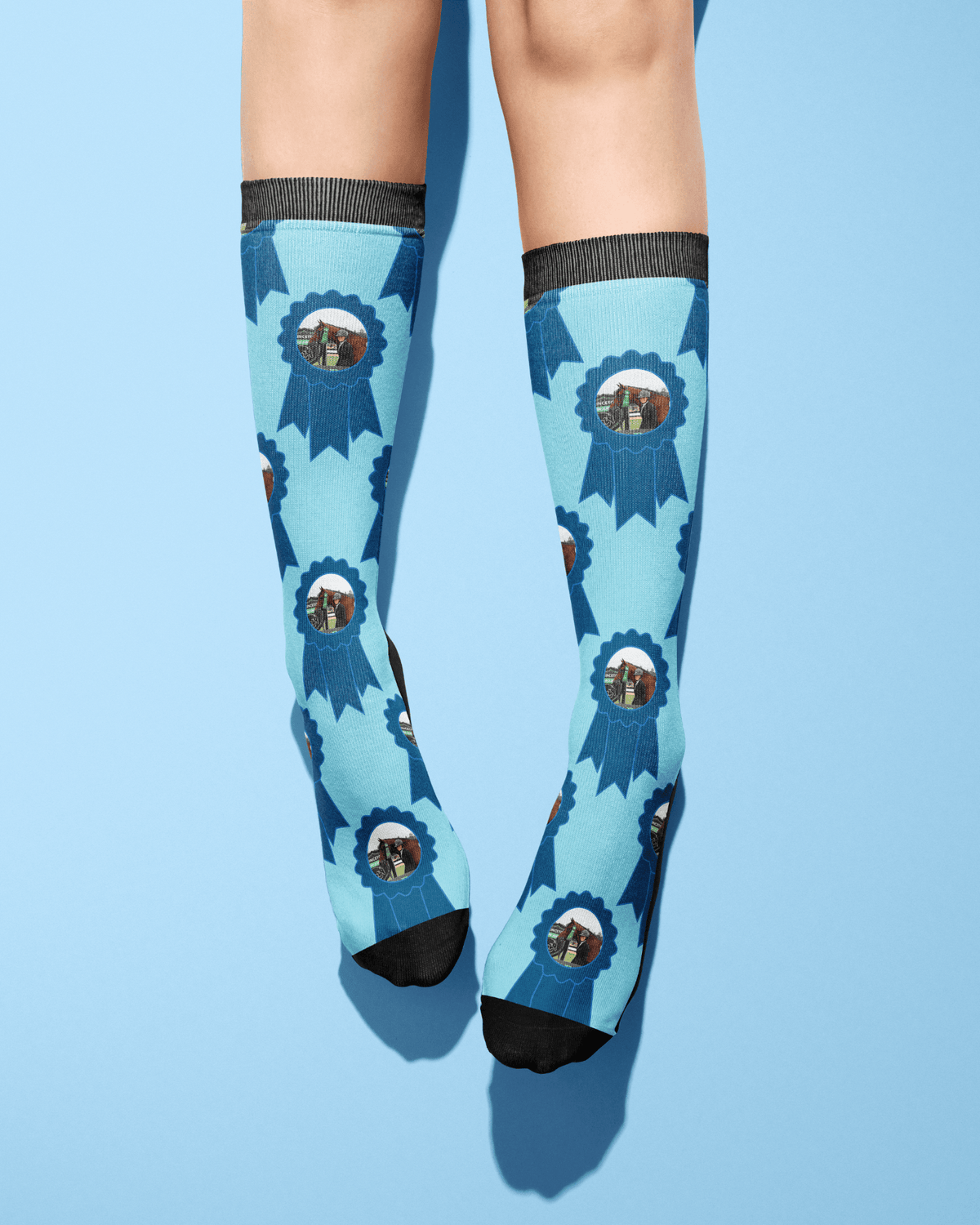 Custom Blue Ribbon Socks with personalized photo on light blue background and black toes and cuffs
