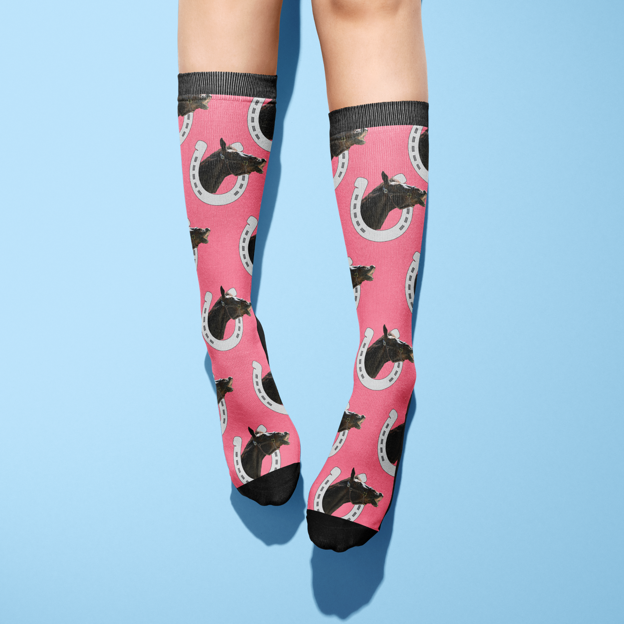 Custom Horseshoe Socks with horse photo and horseshoe pattern on pink background worn on legs