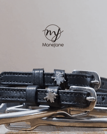 Black leather Canada spur straps with stainless steel buckles and maple leaf charms