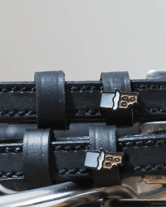 ManeJane Chocolate Bar Spur Straps Spur Straps — black leather, non-stretch, hero image for English riders.