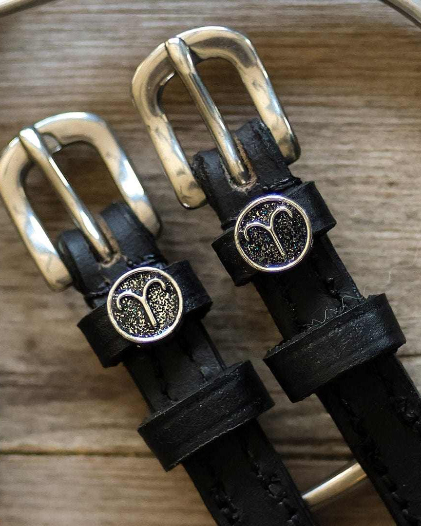 Black leather Aries Spur Straps with stainless steel buckles and custom Aries charm