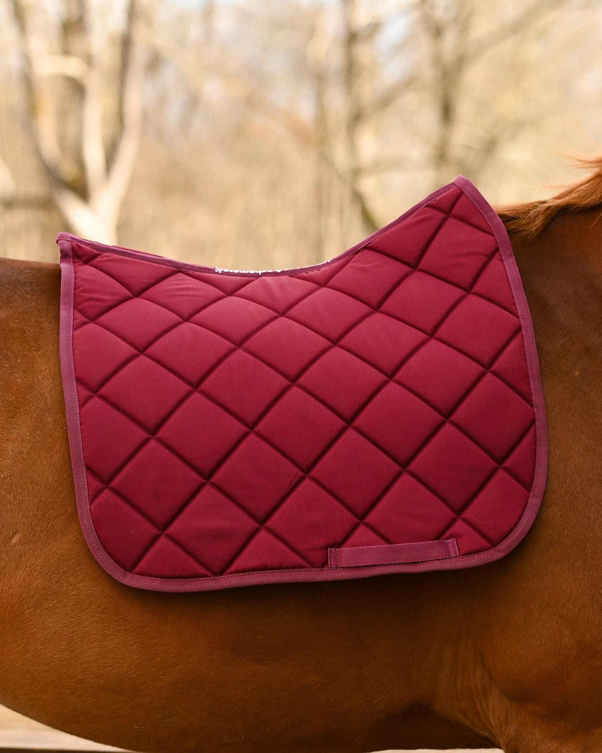 Burgundy all-purpose saddle pad, showing the full pattern layout, by Dreamers & Schemers