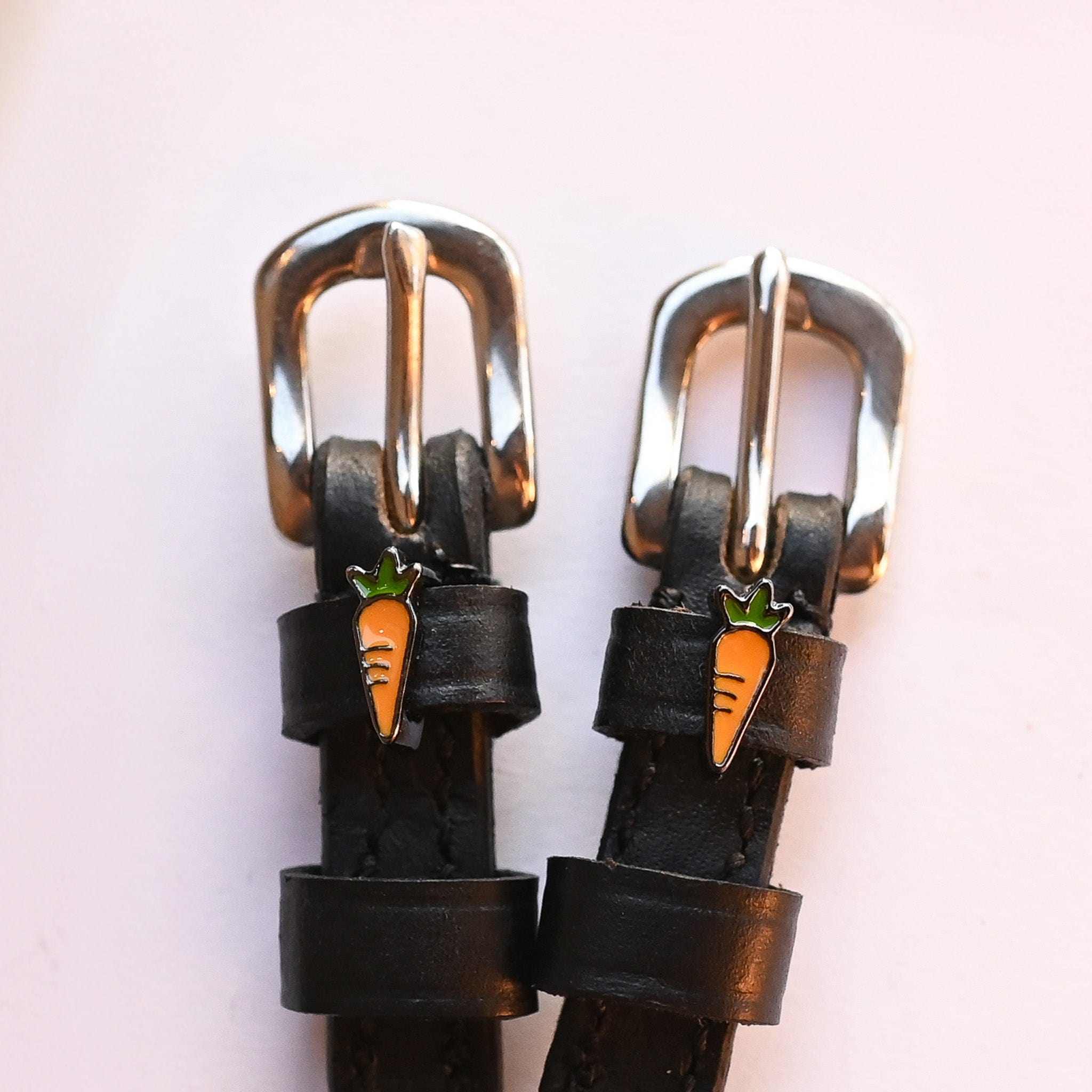 Carrot Spur Straps ManeJane black leather spur straps with non-stretch interior and stainless steel buckle for English ridi.