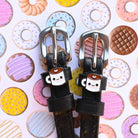 Coffee Spur Straps ManeJane black leather spur straps with non-stretch interior and stainless steel buckle for English ridi.