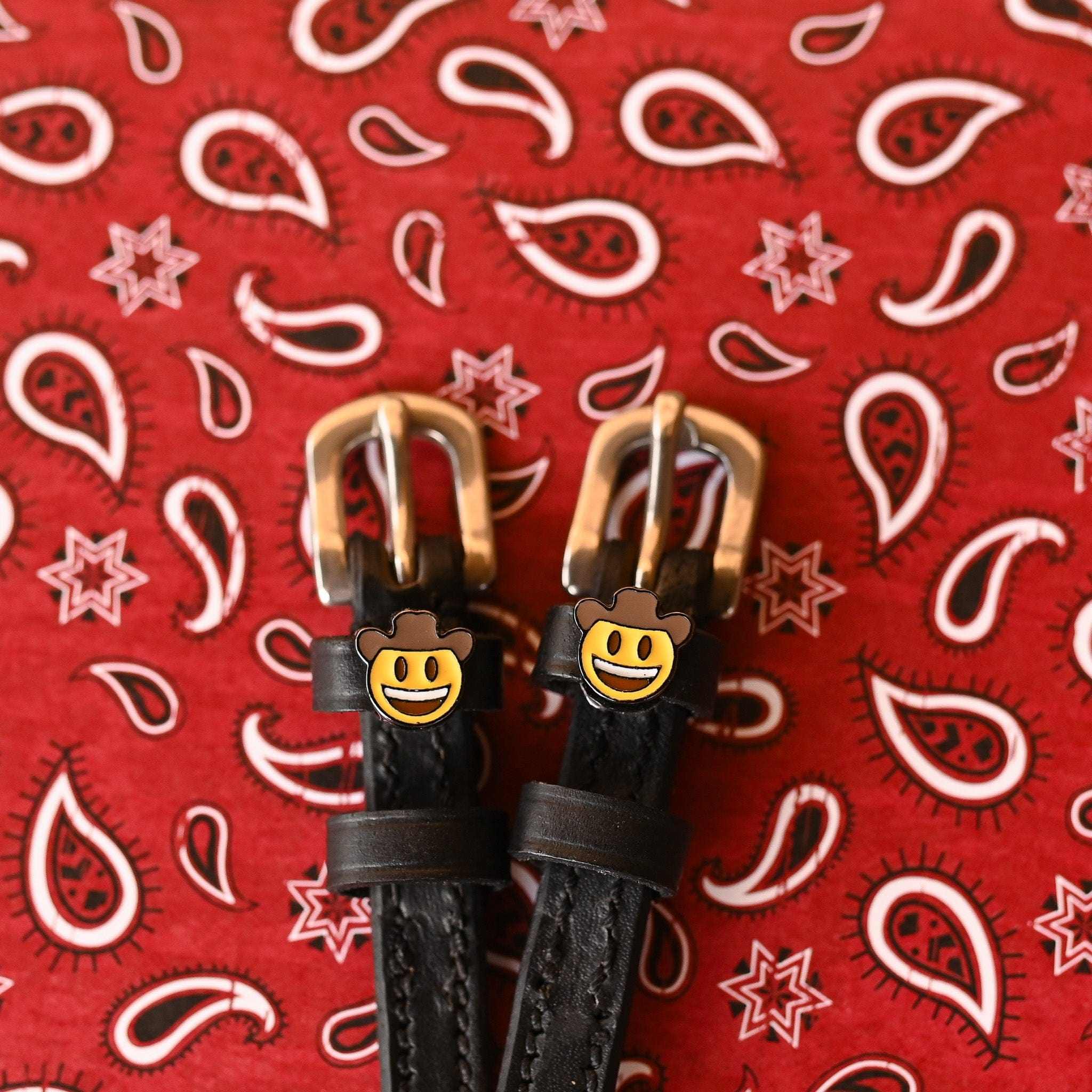 Cowboy Emoji Spur Strap ManeJane black leather spur straps with non-stretch interior and stainless steel buckle for English.