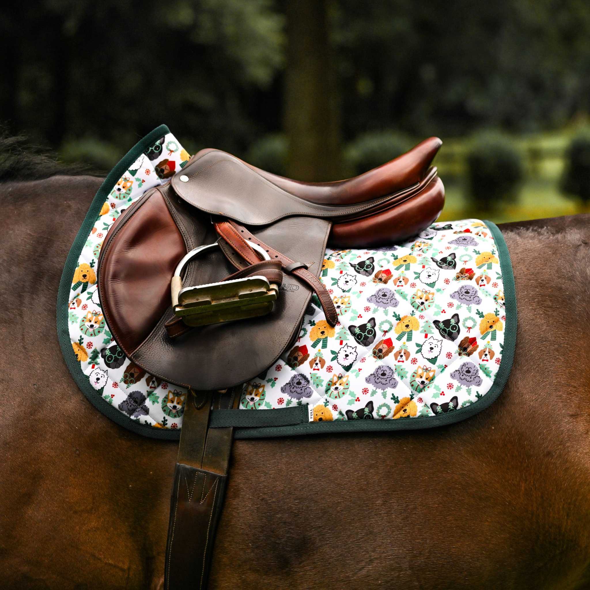 Dreamers & Schemers Deck the Paws Saddle Pad – patterned saddle pad, equestrian gift, horseback riding gear from Dreamers & Schemers Saddle Pads