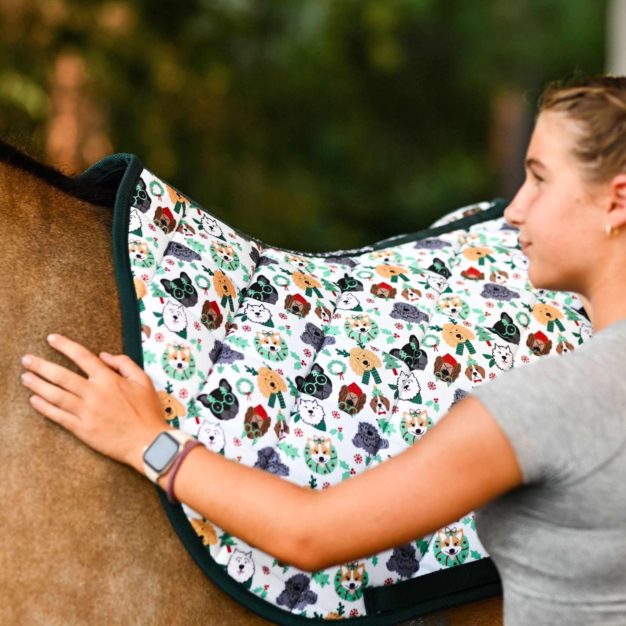 Dreamers & Schemers Deck the Paws Saddle Pad – patterned saddle pad, equestrian gift, horseback riding gear from Dreamers & Schemers Saddle Pads