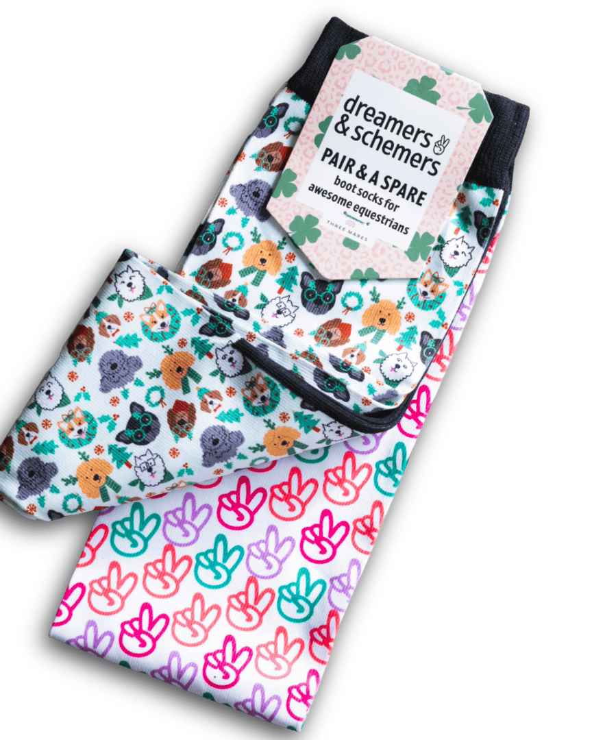 Deck the Paws youth socks with colorful dog and peace sign patterns, durable and comfortable for riding boots