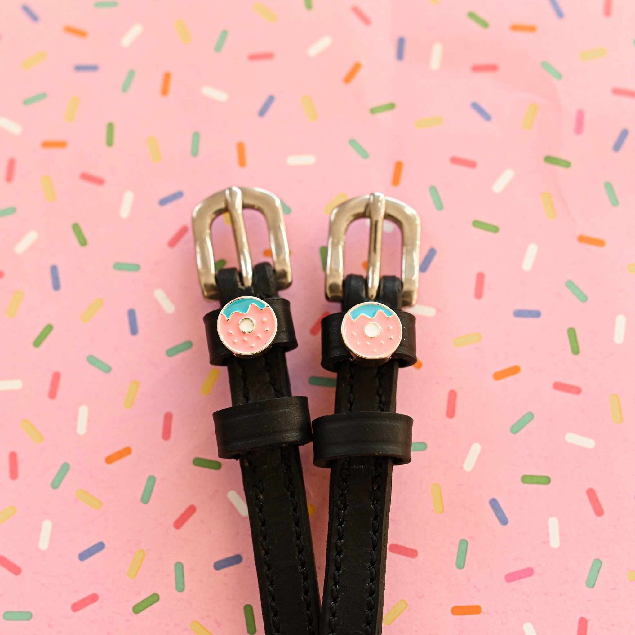 ManeJane Donut Spur Straps Spur Straps — black leather, non-stretch, hero image for English riders.