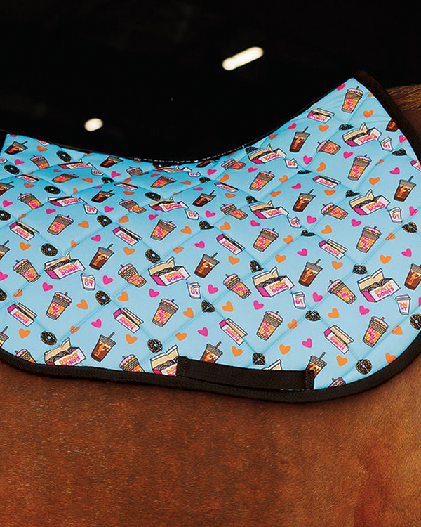 Blue Donut Saddle Pad with coffee and heart pattern on horse back