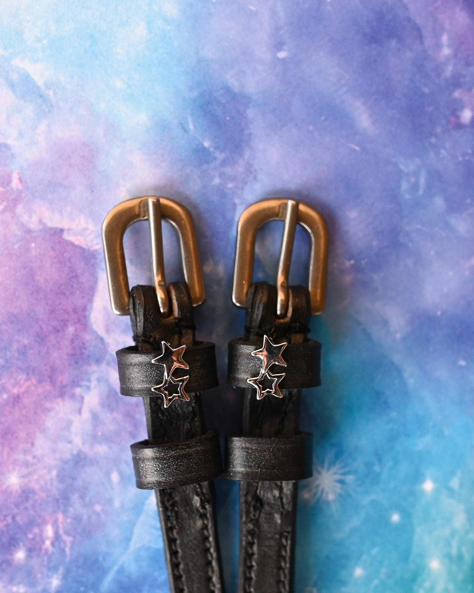 ManeJane Double Star Silver Spur Straps Spur Straps — black leather, non-stretch, hero image for English riders.