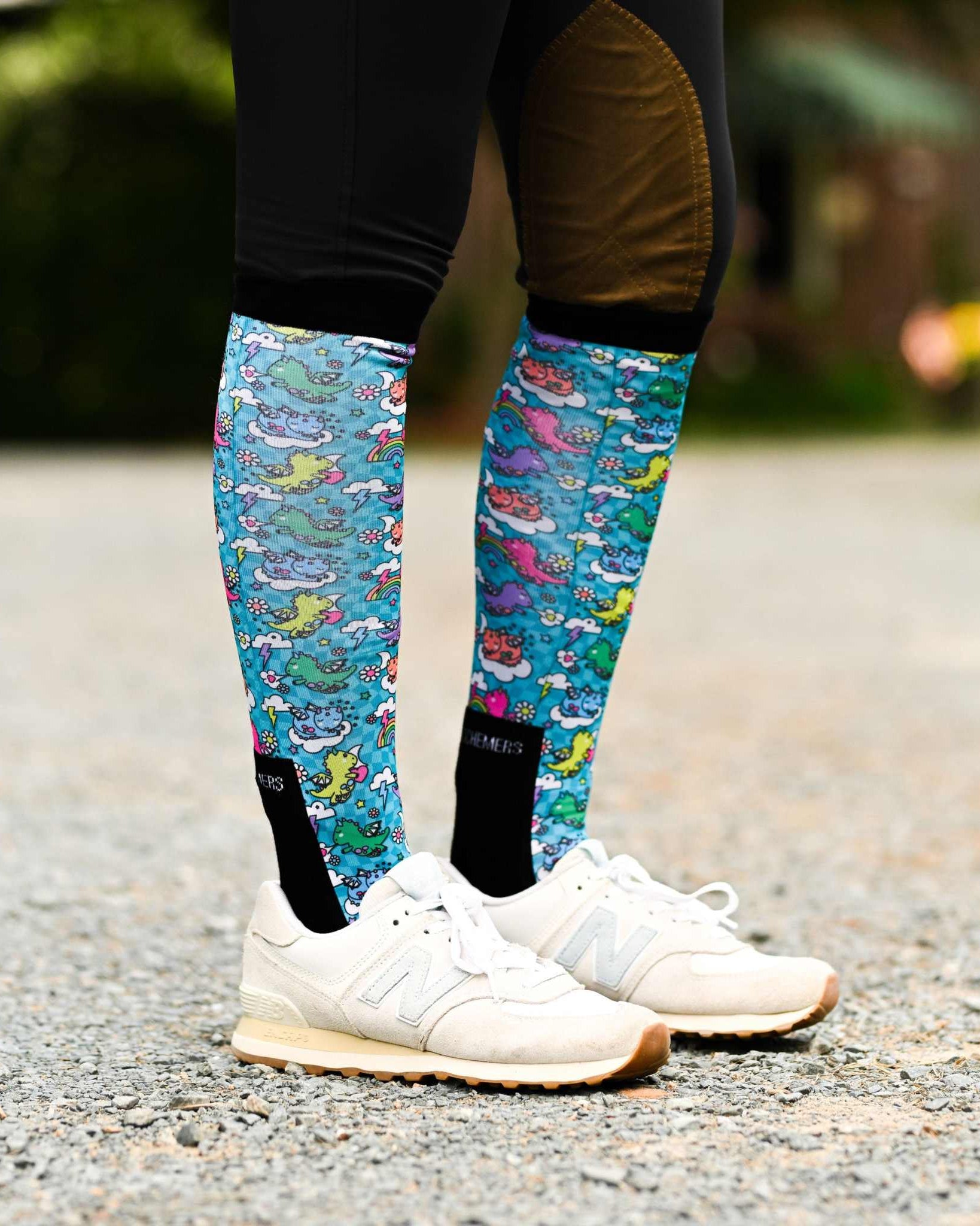 Colorful Dragon Dreams Bundle riding socks worn with white sneakers outdoors