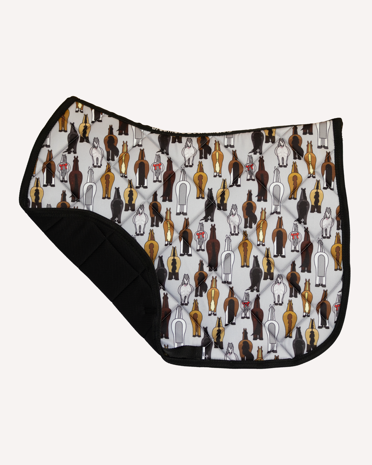Butts saddle pad shown from an alternate angle, full patterned design across the pad