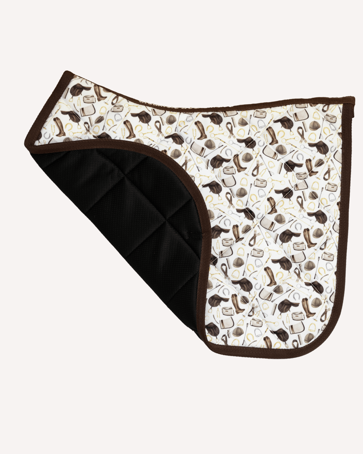 The Hunt saddle pad, corner folded back to reveal the black grippy underside by Dreamers & Schemers