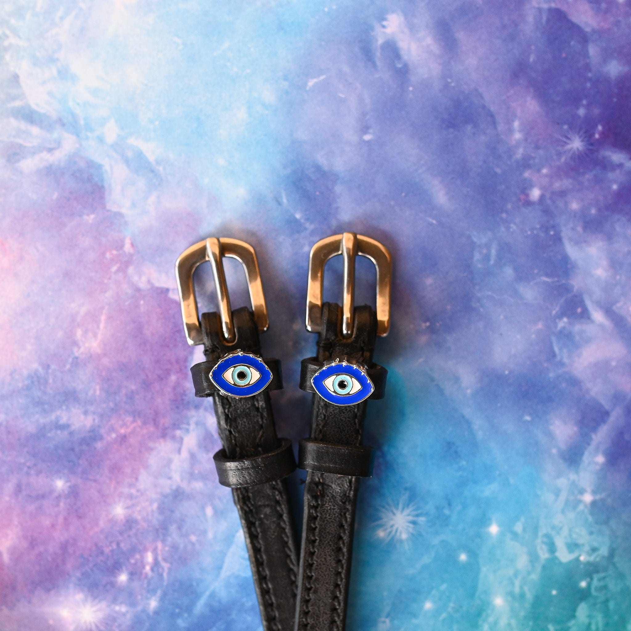ManeJane Eye See You Blue Spur Straps Spur Straps — black leather, non-stretch, hero image for English riders.