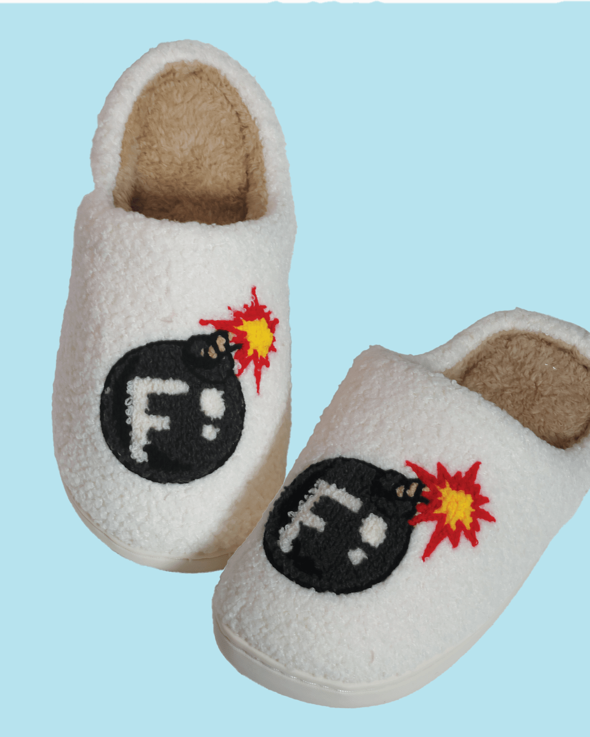 White cozy slippers with embroidered F-bomb design, part of Ultimate F-Bomb Pack equestrian accessories