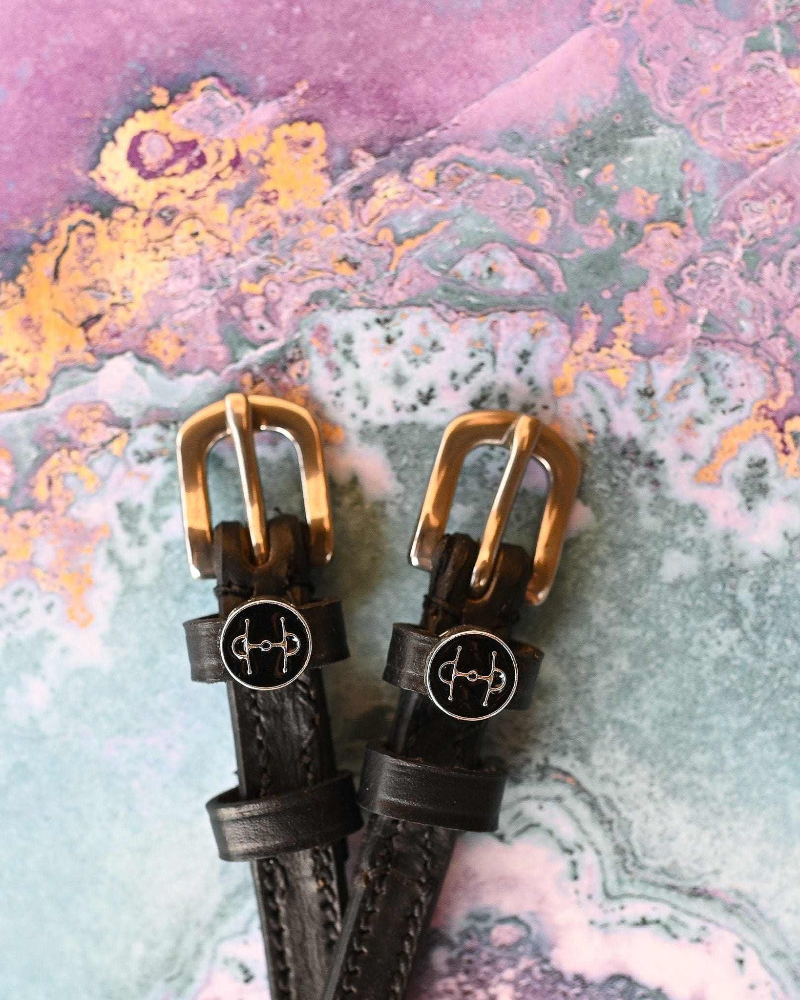 Full Cheek Spur Straps ManeJane black leather spur straps with non-stretch interior and stainless steel buckle for English .