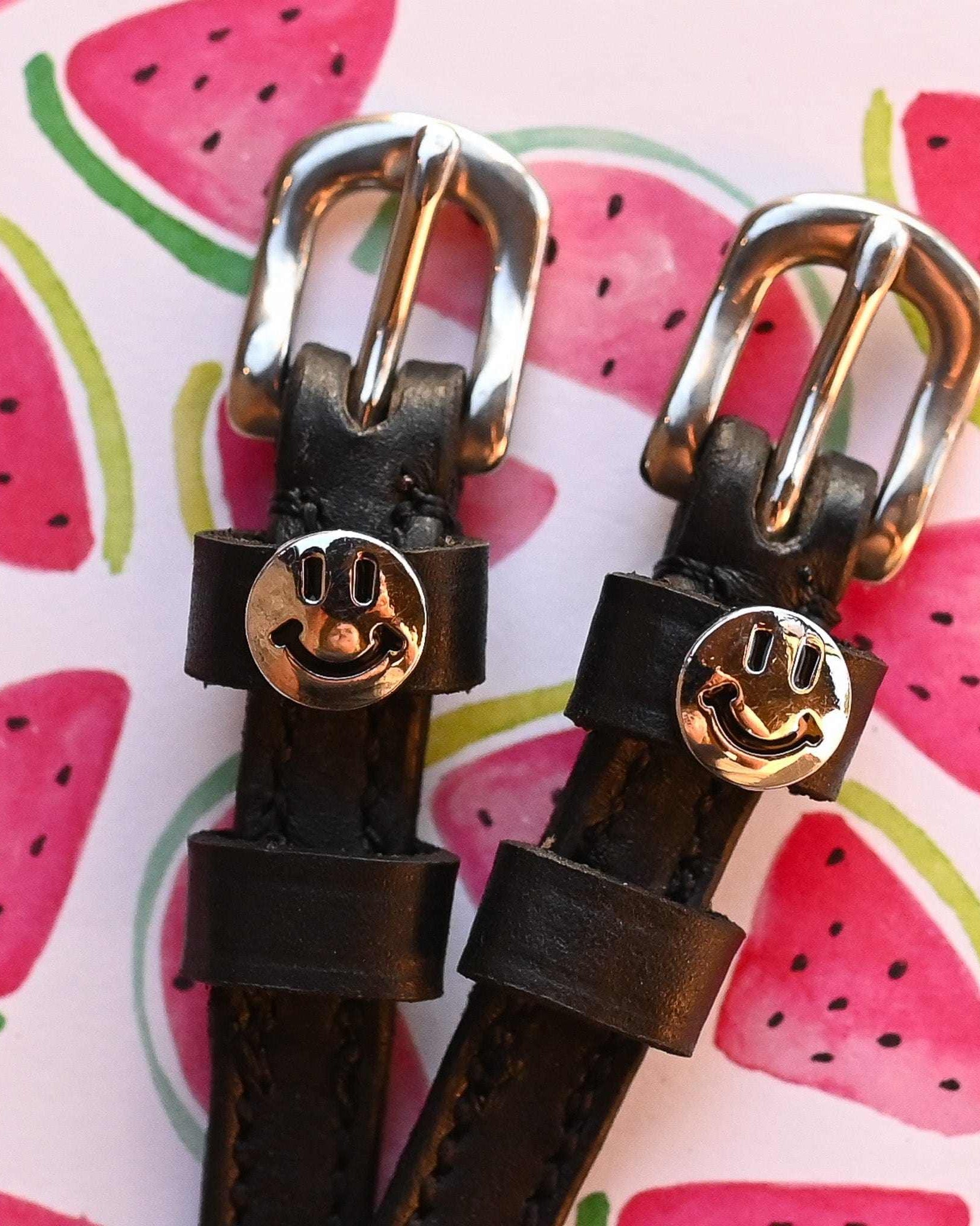 Happy Face Spur Straps ManeJane black leather spur straps with non-stretch interior and stainless steel buckle for English .