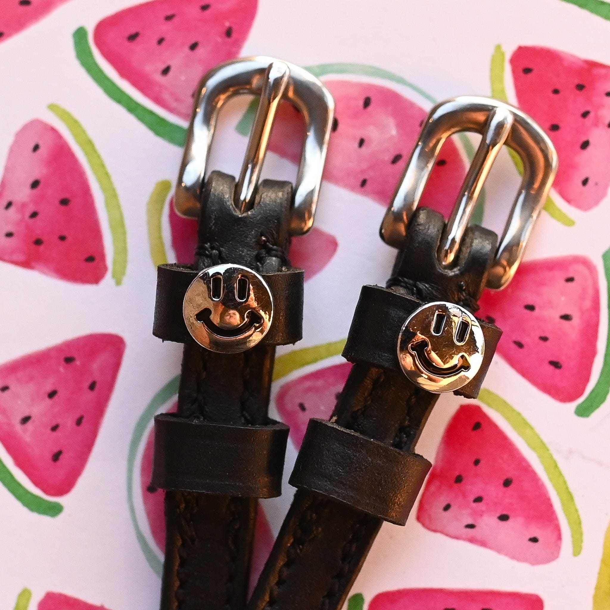 Happy Face Spur Straps ManeJane black leather spur straps with non-stretch interior and stainless steel buckle for English .