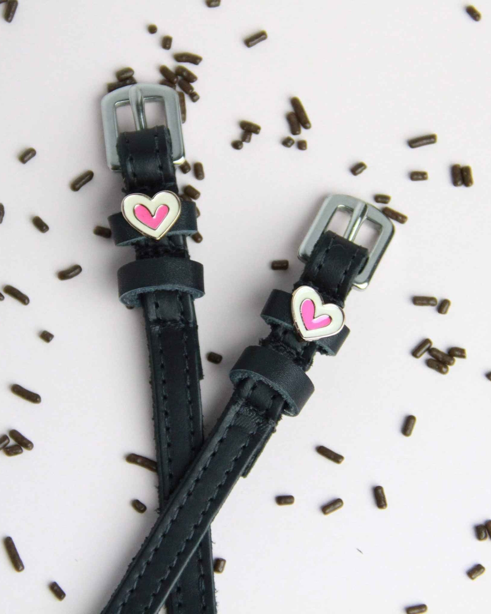 Heart Smooshes Spur Straps ManeJane black leather spur straps with non-stretch interior and stainless steel buckle for Engl.