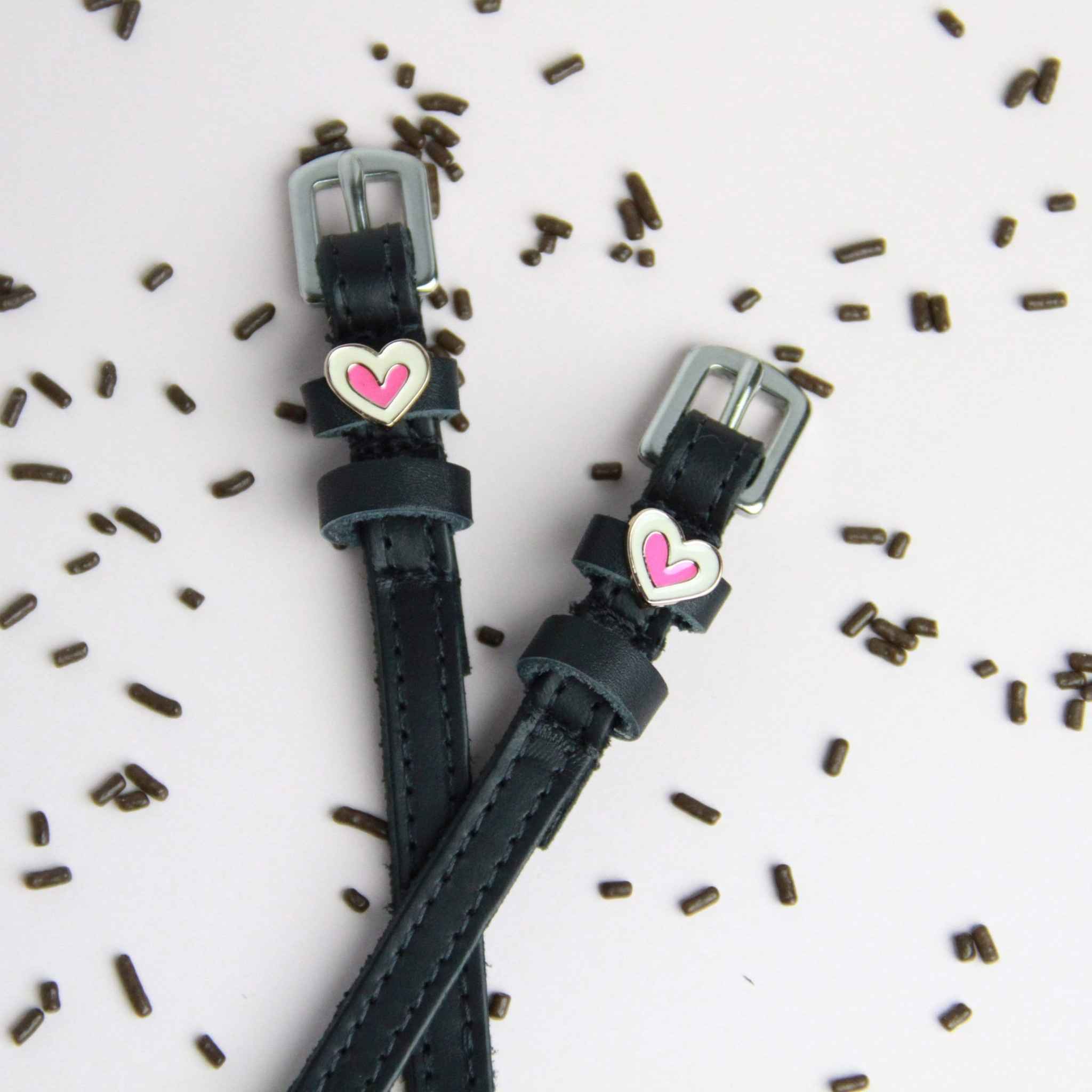 Heart Smooshes Spur Straps ManeJane black leather spur straps with non-stretch interior and stainless steel buckle for Engl.