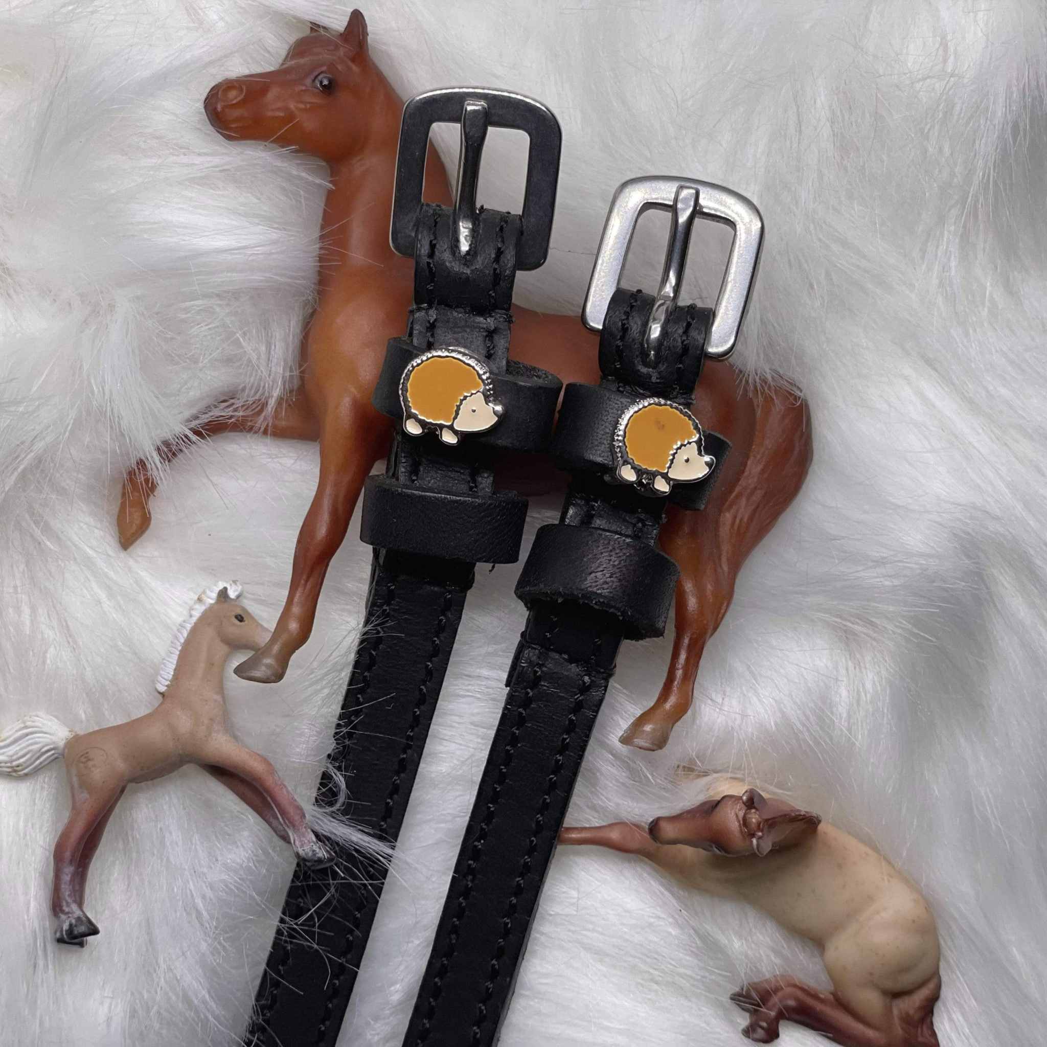 Hedgehog Spur Straps ManeJane black leather spur straps with non-stretch interior and stainless steel buckle for English ri.