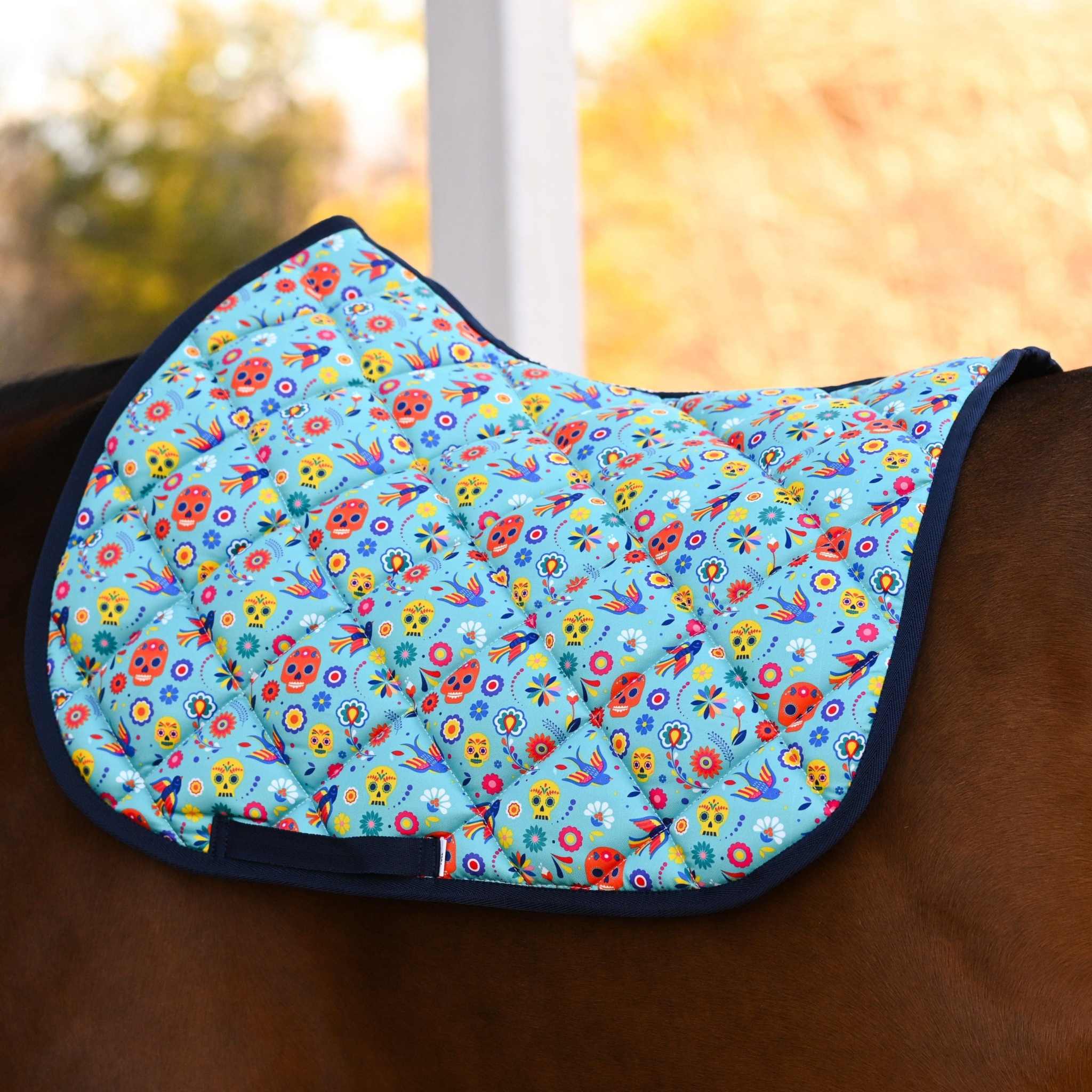 Dreamers & Schemers Holiday Day of the Dead Saddle Pad – patterned saddle pad, equestrian gift, horseback riding gear from Dreamers & Schemers Saddle Pads