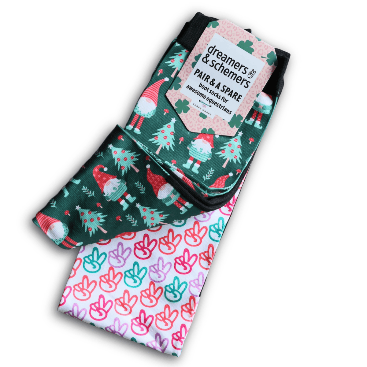 holiday-themed boot socks with gnome and peace sign designs by Pair & A Spare