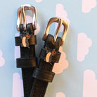 Hot Dog Spur Straps ManeJane black leather spur straps with non-stretch interior and stainless steel buckle for English rid.