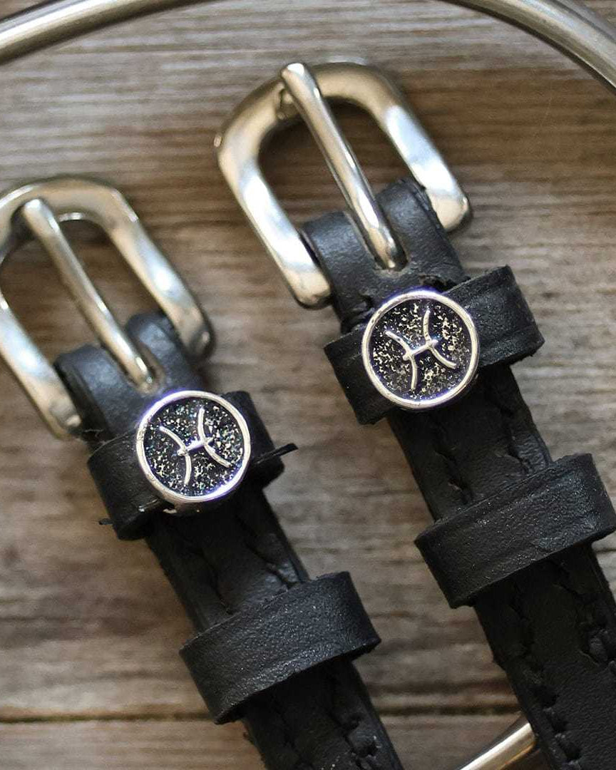 Black leather Pisces Spur Straps with stainless steel buckles and custom zodiac charm