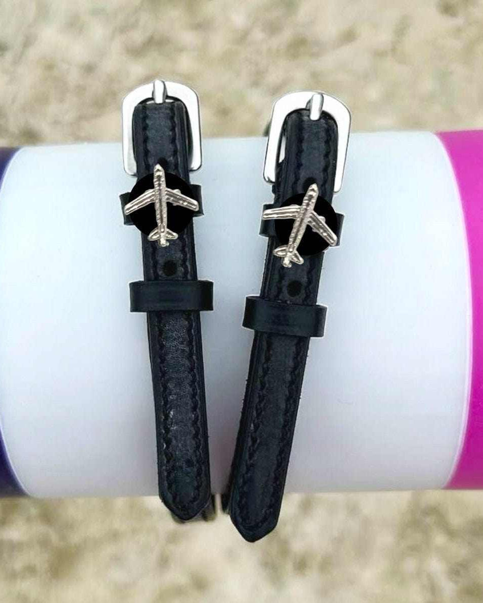 Plane Spur Straps ManeJane black leather spur straps with non-stretch interior and stainless steel buckle for English ridin.