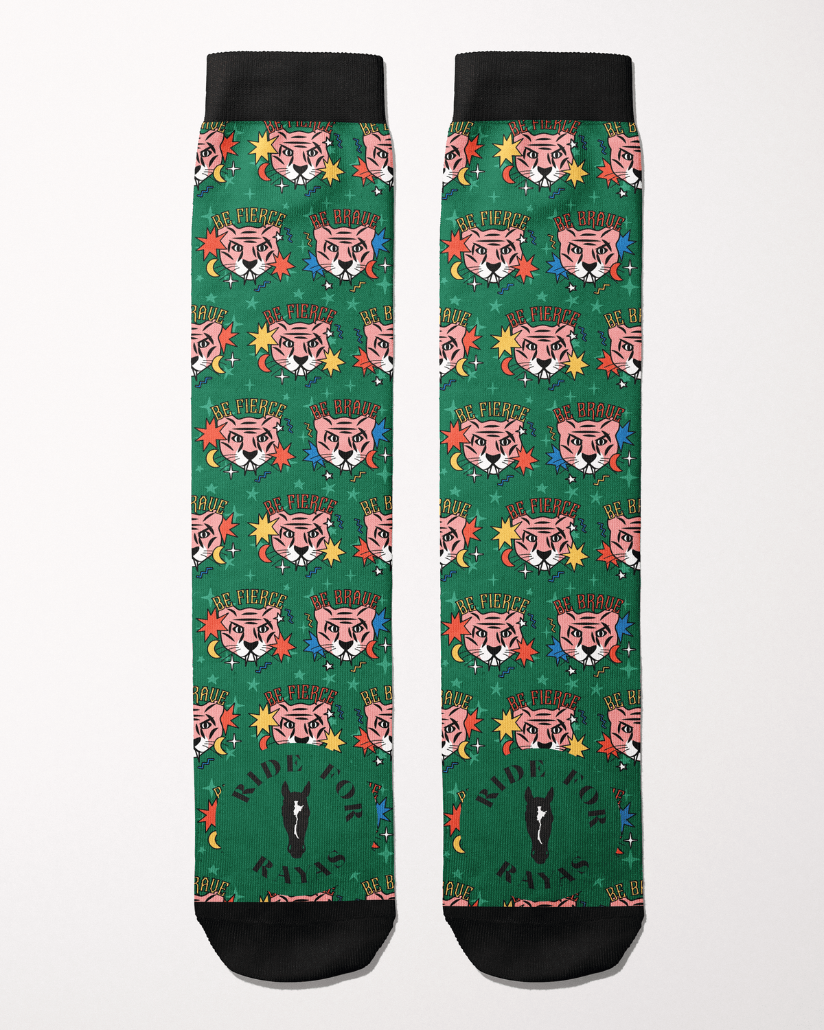 Ride for Rayas Be Brave equestrian boot socks in green with pink tiger faces, flat lay of the pair, by Dreamers & Schemers