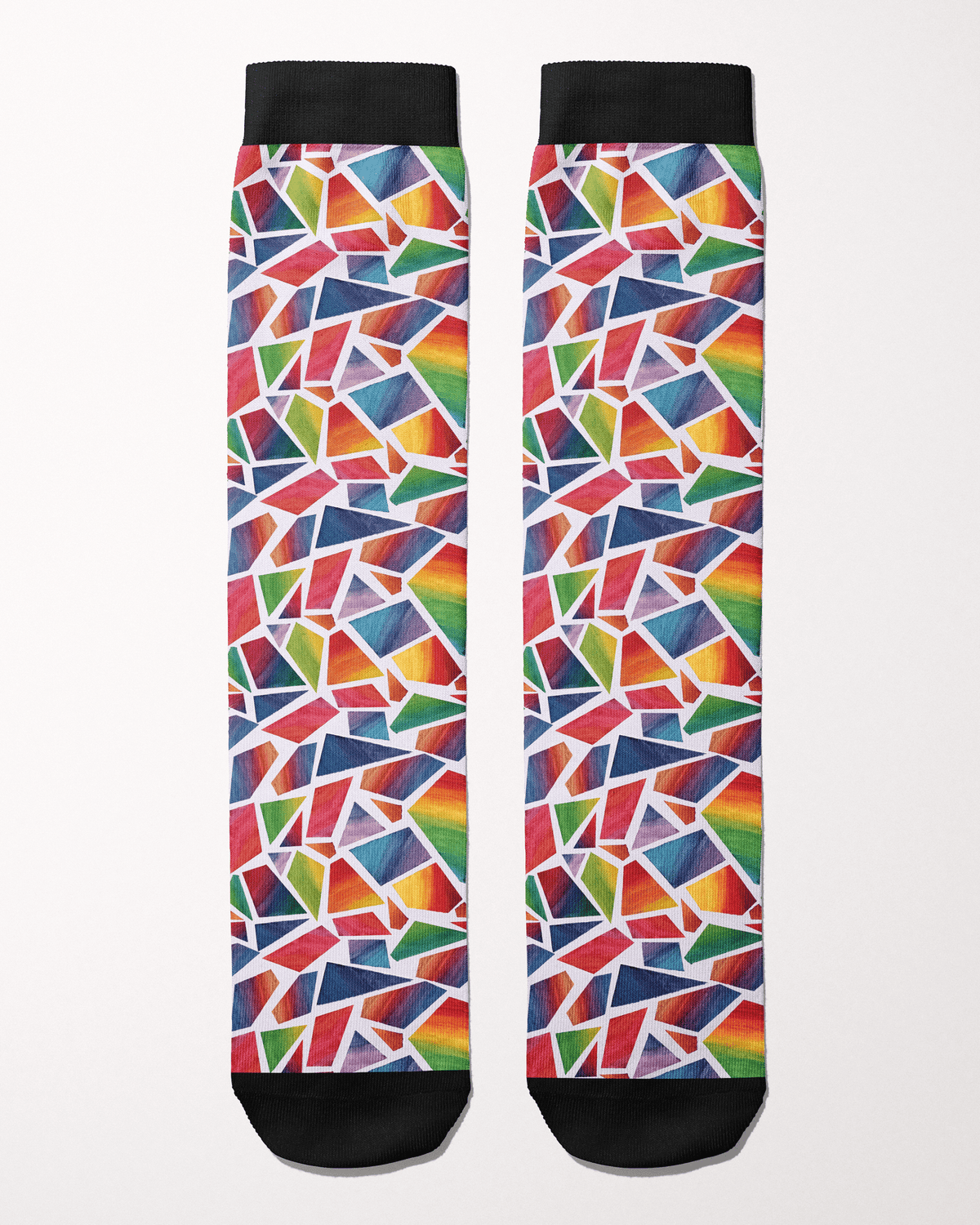 Ride for Rayas Original Art equestrian boot socks in a rainbow painted mosaic print, flat lay, by Dreamers & Schemers