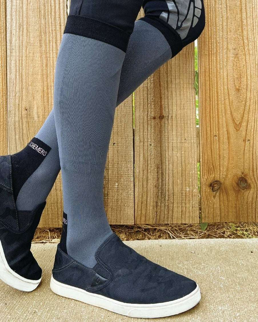 Grey solid color knit socks with stretchy fit and thin cotton terry footbed
