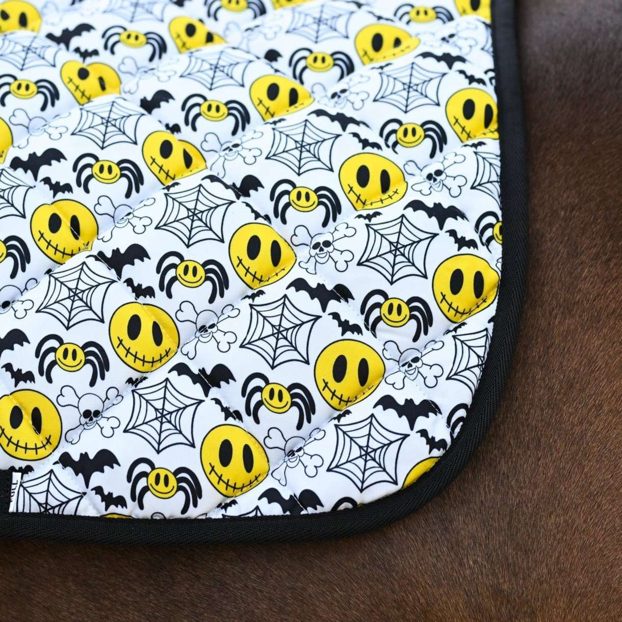 Dreamers & Schemers Spooky Smile Saddle Pad – patterned saddle pad, equestrian gift, horseback riding gear from Dreamers & Schemers Saddle Pads